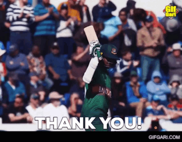 a cricket player is holding up his bat and says thank you