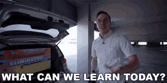 a man standing in front of a car with the words " what can we learn today " on the bottom