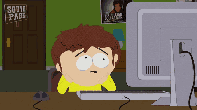 a cartoon character is sitting in front of a computer in front of a south park sign