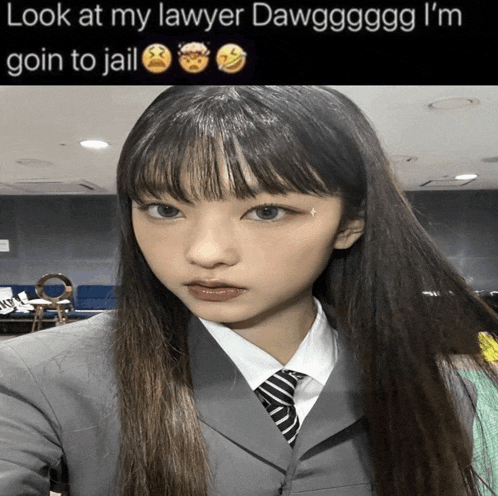 a girl in a suit and tie with the caption look at my lawyer dawg