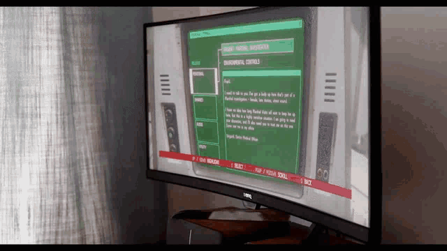 a benq computer monitor displays a green screen with environmental controls written on it