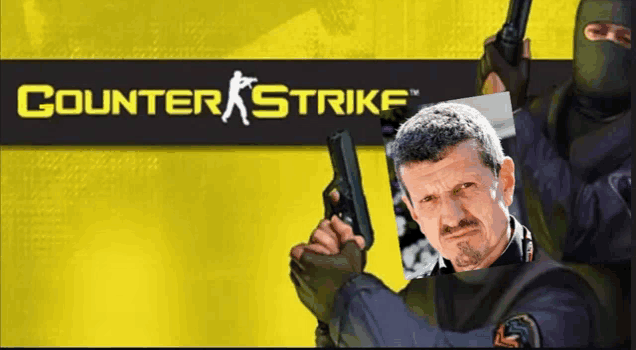 a man is holding a gun in front of a counter strike sign