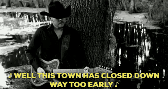 a black and white photo of a man playing a guitar with the words " well this town has closed down way too early " below him