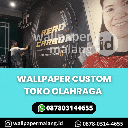 an ad for wallpaper custom toko olahraga shows a man painting on a wall