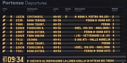 a board shows the departures of trains and shows the time as 09:34