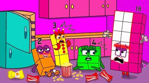 a group of blocks are sitting on the floor in a kitchen eating popcorn and drinking coca cola .