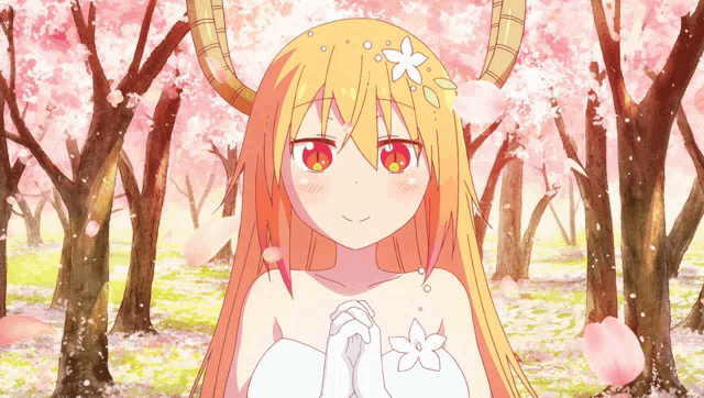 a girl with a flower in her hair stands in a forest