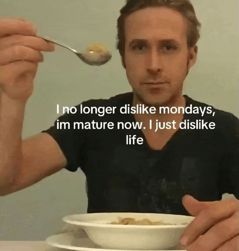 a man is holding a spoon in front of a bowl of cereal with the caption i no longer dislike mondays im mature now