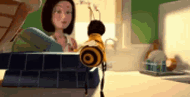 a cartoon bee is sitting on a counter next to a woman .