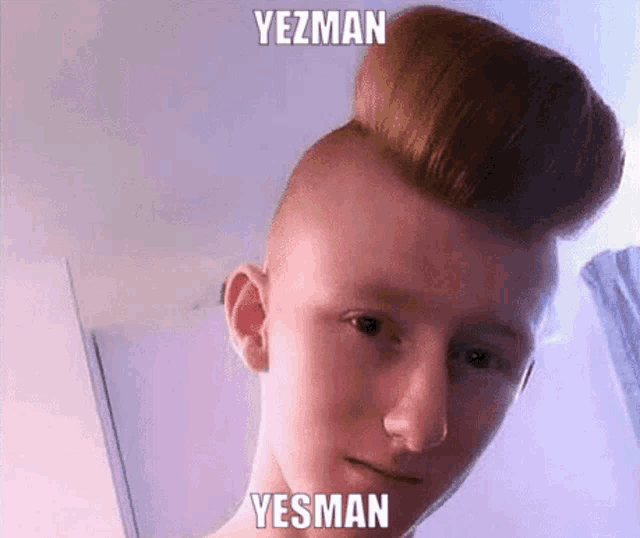 a young man with a big bun on his head has the name yezman on his face .