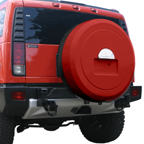 a red jeep has a red spare tire cover