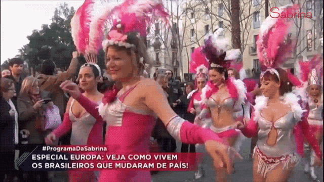 a group of women are dancing in front of a crowd with the words programa da sabrina on the bottom