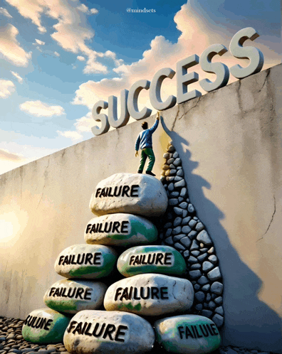 a man climbs a rock wall with the word success written on it