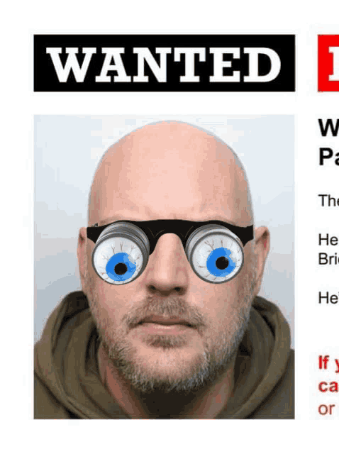 a wanted poster with a bald man wearing glasses with big eyes