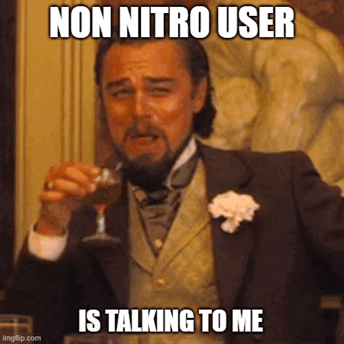 a man in a suit is holding a glass of wine and making a funny face with the caption non nitro user