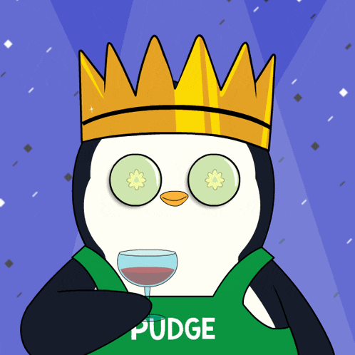 a penguin wearing a crown and a green shirt that says pudge holds a glass of wine