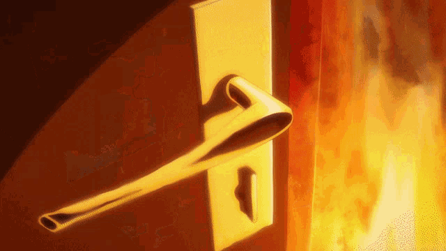 a door with a gold handle and a fire in the background