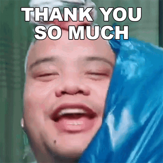 a man says thank you so much while holding a blue bag