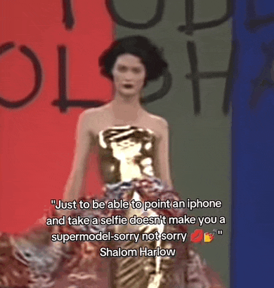 a woman in a gold dress is walking down a runway with a quote by shalom harlow