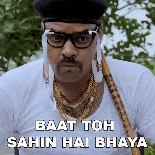 a man with glasses and a mustache has the words baat toh sahin hai bhaya below him