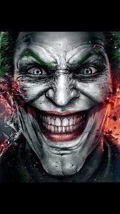 a close up of the face of the joker .