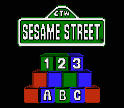 a sesame street sign is above a stack of blocks