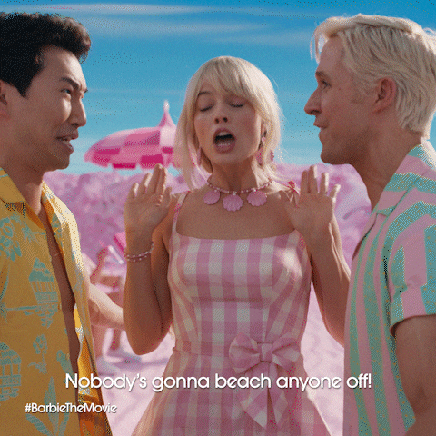 a woman in a pink dress stands between two men and says nobody 's gonna beach anyone off #barbiethemovie