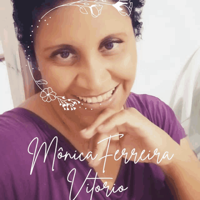 a woman in a purple shirt with the name monica ferreira vitorio on the bottom