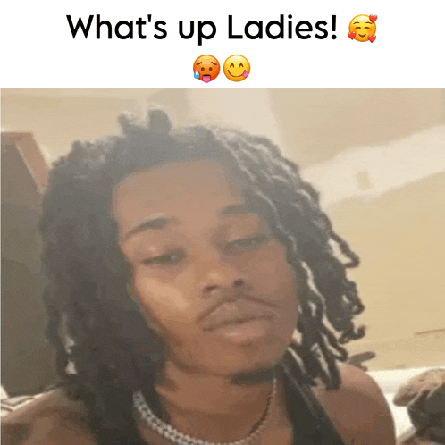 a picture of a man with dreadlocks and the words " what 's up ladies "