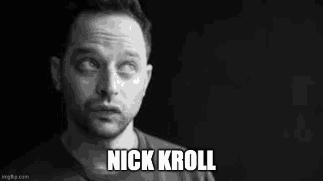 a black and white photo of a man with a beard and the name nick kroll .