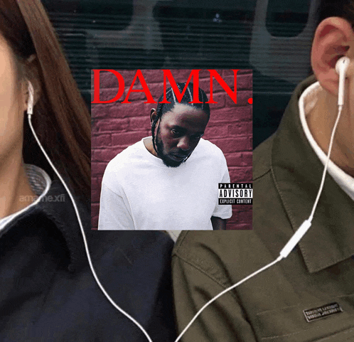 a man wearing ear buds is listening to damn album