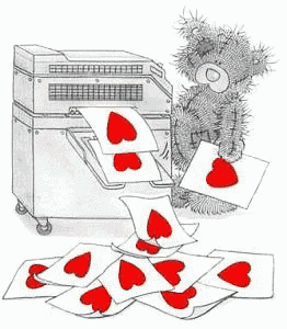 a teddy bear is standing next to a printer and a pile of cards with hearts on them