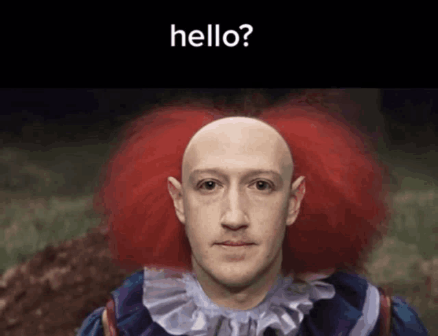 a man with red hair and a bald head is dressed as a clown and says hello