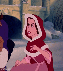 belle from beauty and the beast is wearing a red cape with a white hood