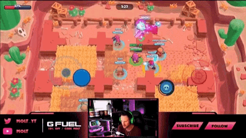 a man is playing a video game with a gfuel logo