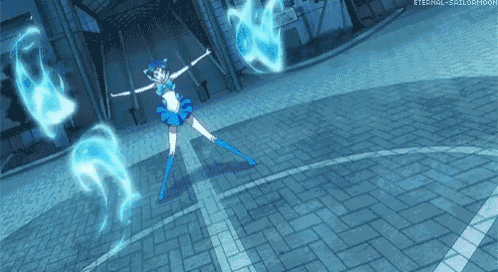 a girl in a blue costume is standing on a brick sidewalk with her arms outstretched .