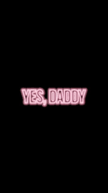 a neon sign that says `` yes , daddy '' on a black background