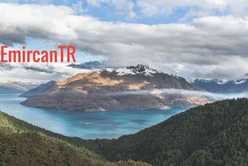 a picture of a lake with mountains in the background and the words emircantr in red