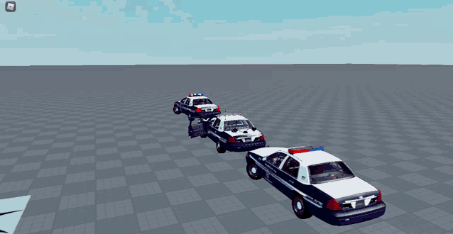 three police cars are lined up in a row