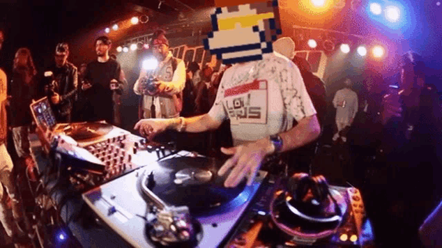 a man with a pixelated head is playing music on a turntable in front of a crowd .