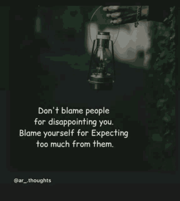 a person holding a lantern with a quote that says " don t blame people for disappointing you "