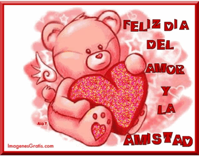 a teddy bear holding a heart with the words " feliz dia del amor y la amistad "