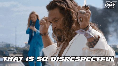 a man with long hair holds a knife in front of a sign that says " that is so disrespectful "