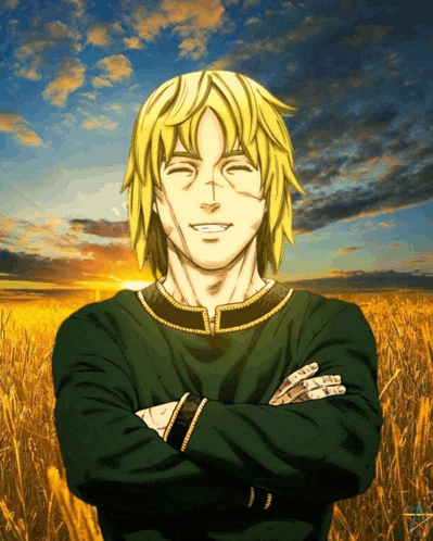 a man with his arms crossed stands in a field of tall grass