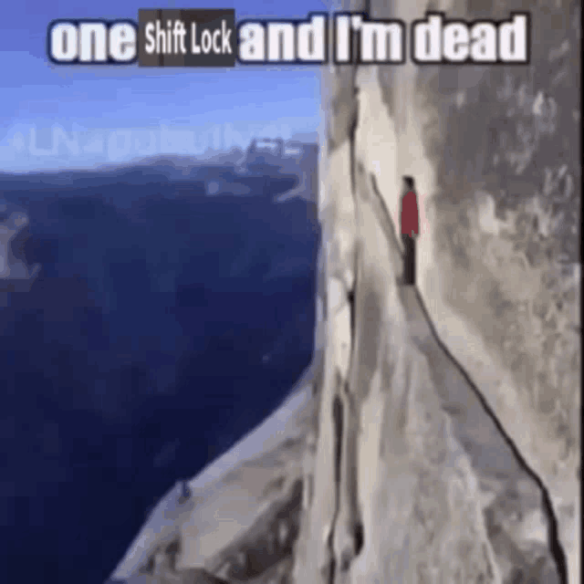 a man climbs a mountain with the words one shift lock and i 'm dead below him