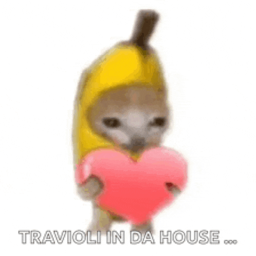 a kitten dressed as a banana is holding a pink heart .