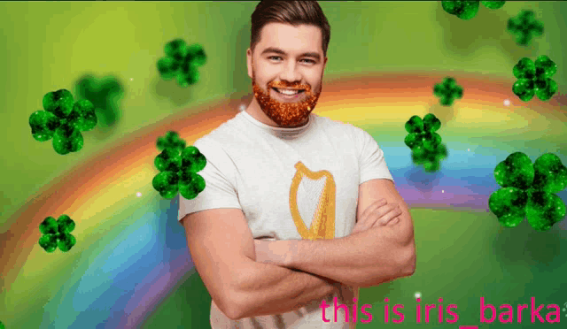 a man with his arms crossed stands in front of a rainbow and shamrocks