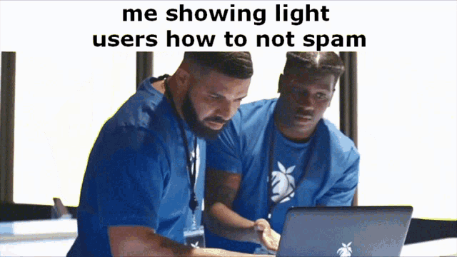 two men are looking at a laptop with a meme that says me showing light users how to not spam