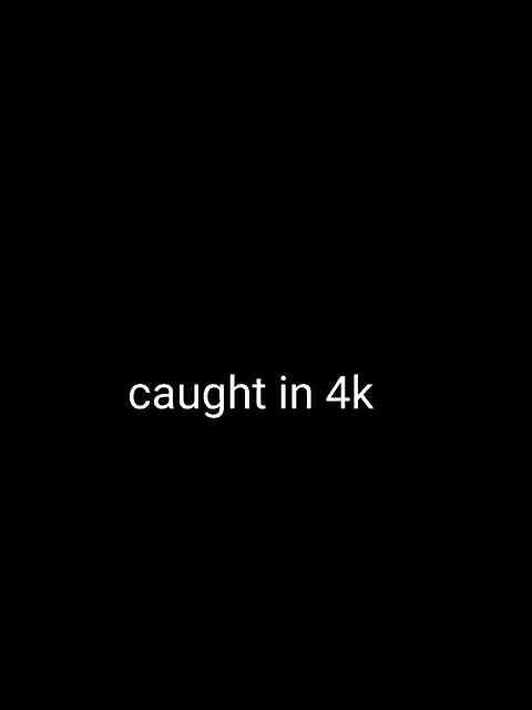 a black background with the words `` caught in 4k '' written in white letters .