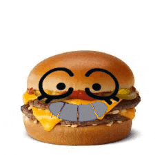 a hamburger with a face drawn on it and a big smile on it .